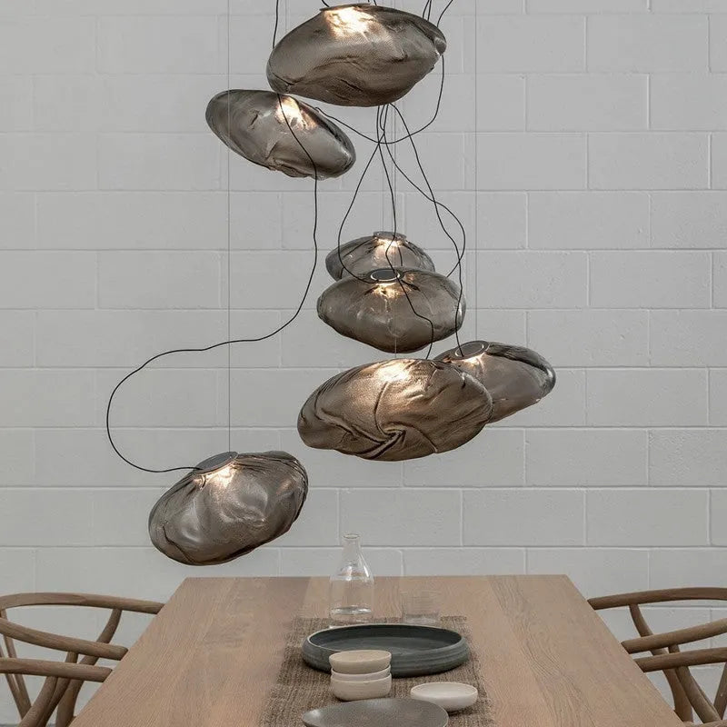 Modern glass chandelier with LED lighting in amber, clear or smoke grey colour options