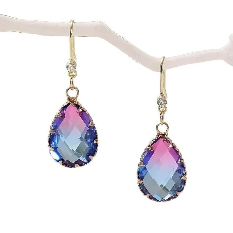 Women's heart-shaped fashion earrings in coloured glaze with four colour options including blue, yellow, purple and red variations