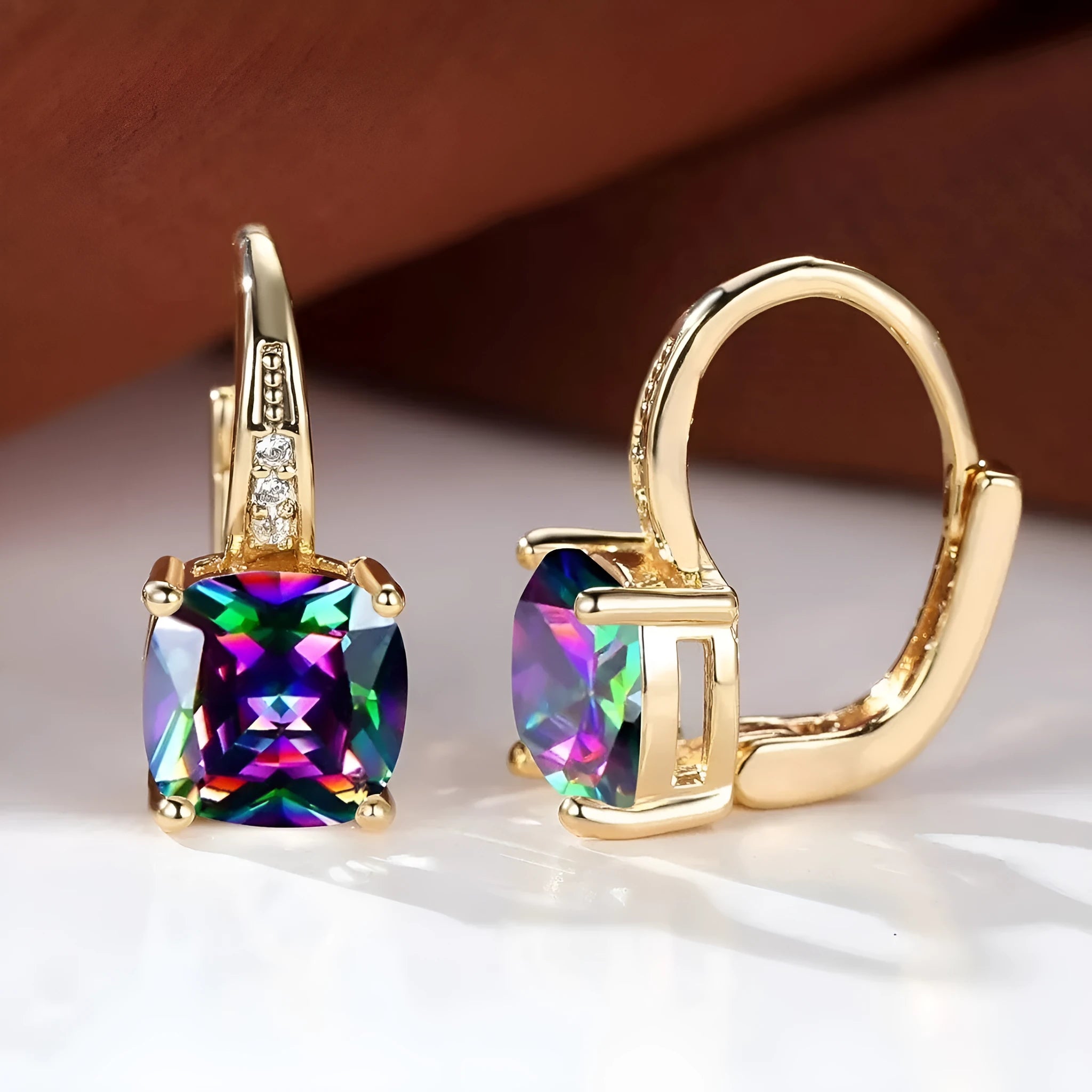 Quadrilateral geometric copper ear clip with colourful moissanite inlay and electroplated metallic finish