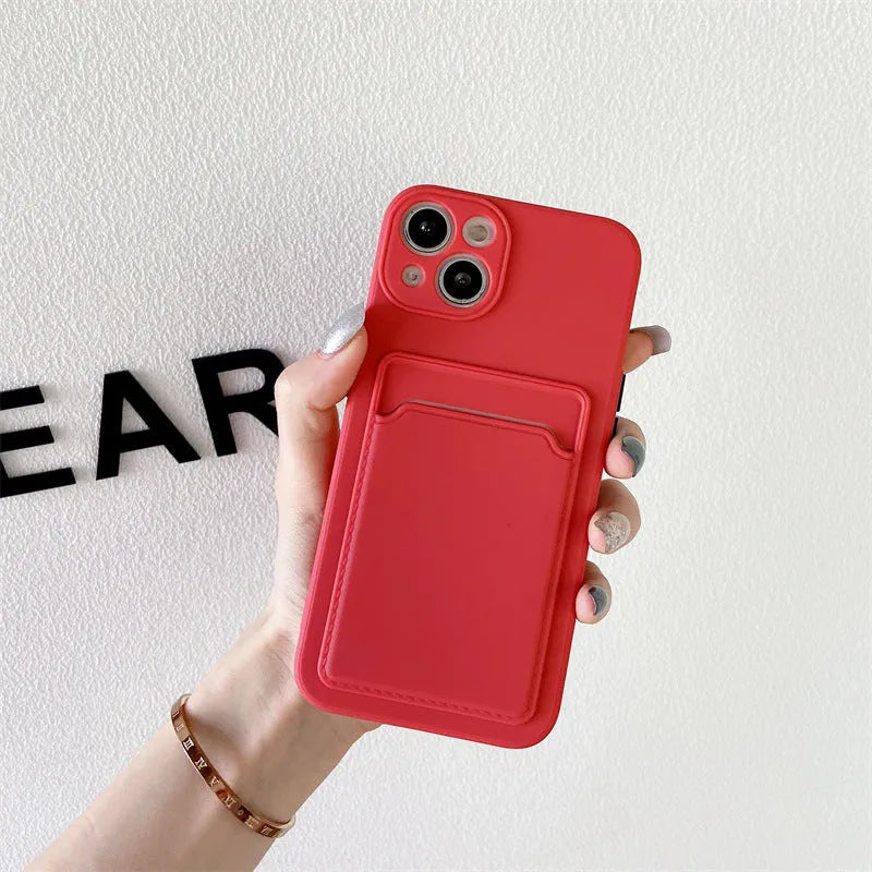 Sky blue silicone iPhone case with a card slot on the back for iPhone 16 and older models.