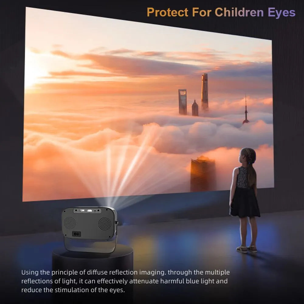 Black portable HD projector with remote control on desk