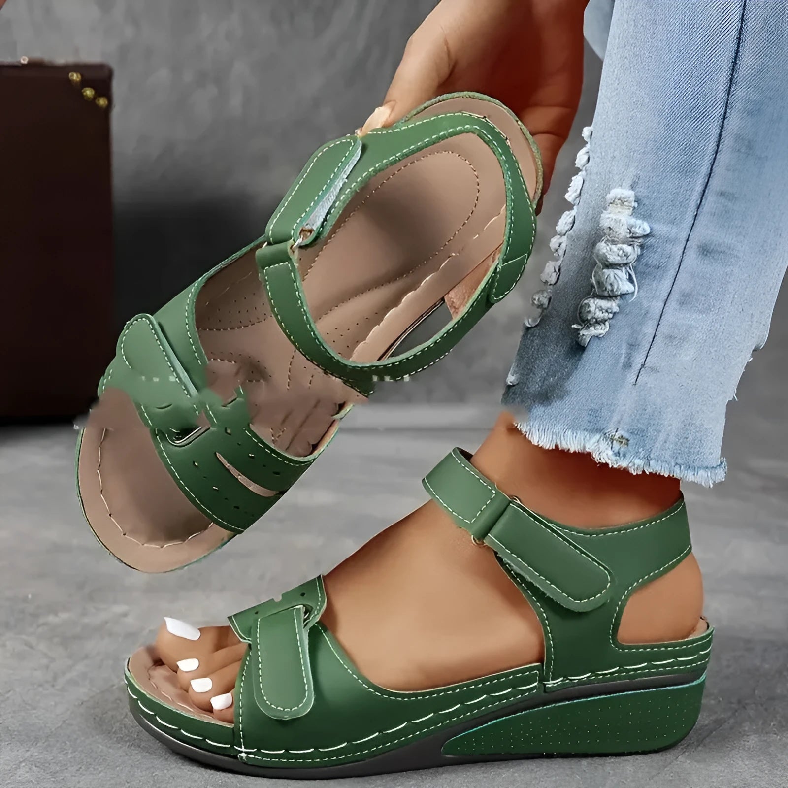 Women's beige plus size sandals with a thick composite sole and an adjustable Velcro strap fastener.