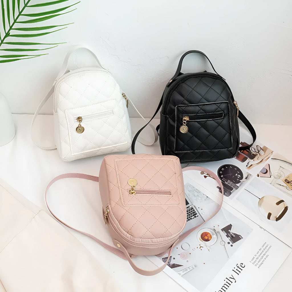 Hard Korean-style backpack with embroidery detail measuring 16x7x19cm in pink colour