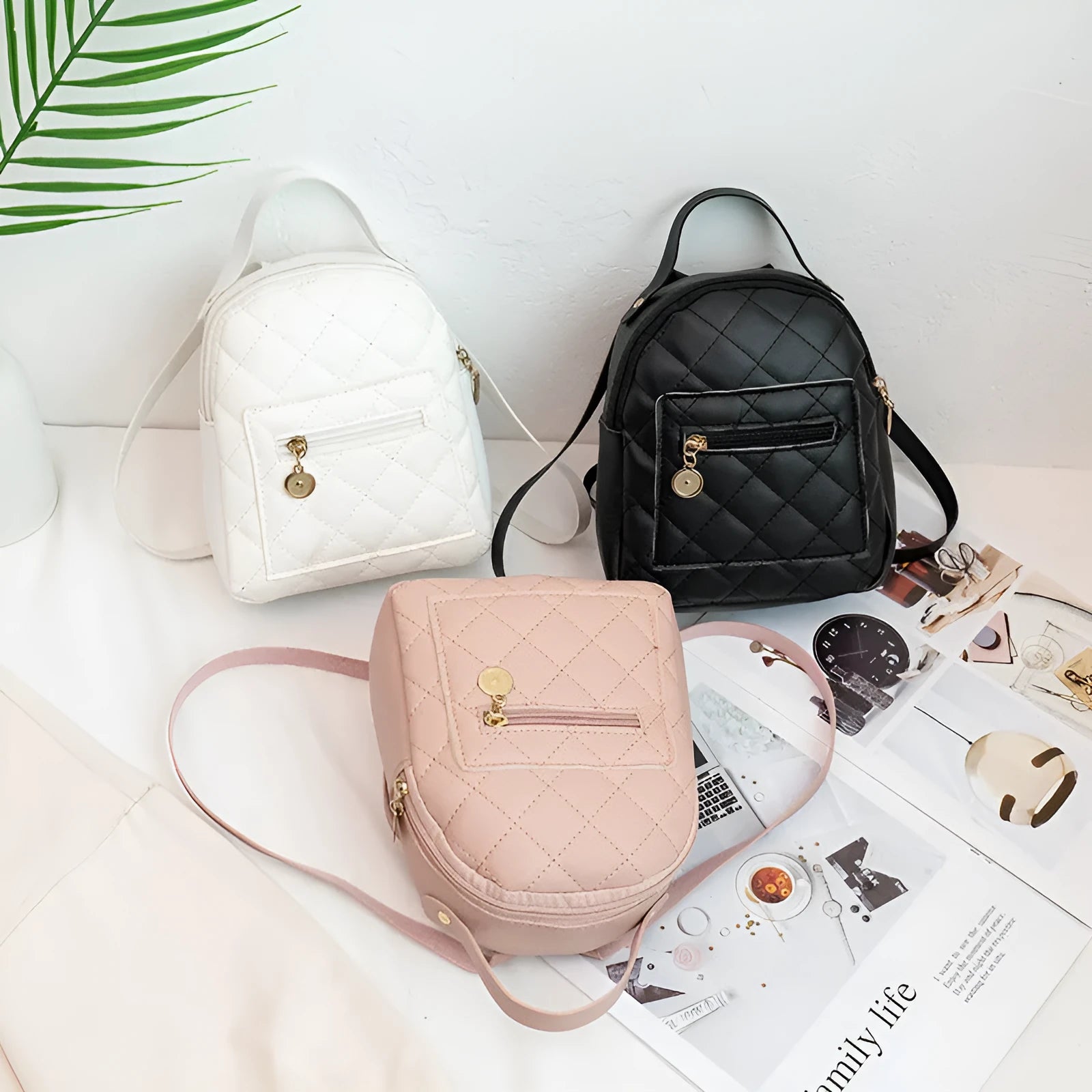 Hard Korean-style backpack with embroidery detail measuring 16x7x19cm in pink colour