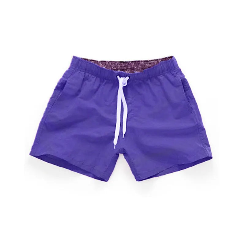 Men's straight leg beach shorts in multiple colours including fluorescent yellow for surfing