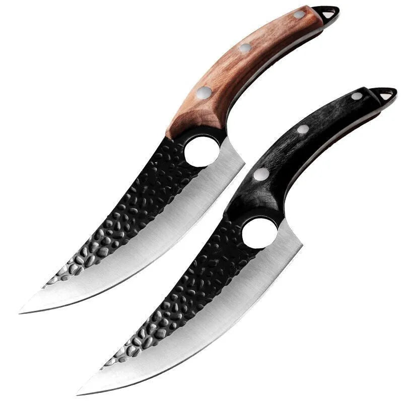 Small scimitar boning knife with hammer pattern finish and black leather sheath on surface