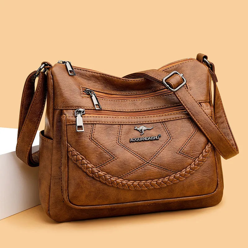 Soft black PU leather crossbody shoulder bag with a horizontal square shape and large capacity