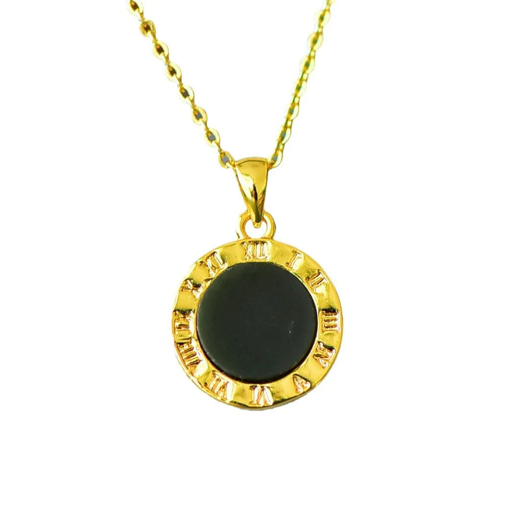 Flat Hetian jade pendant necklace with copper inlay on a gray background.