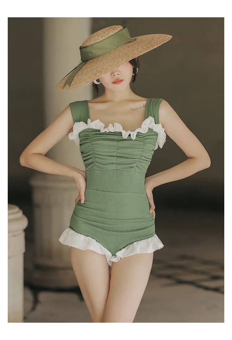 Korean style triangle top one-piece swimsuit for women with high waist in black colour.
