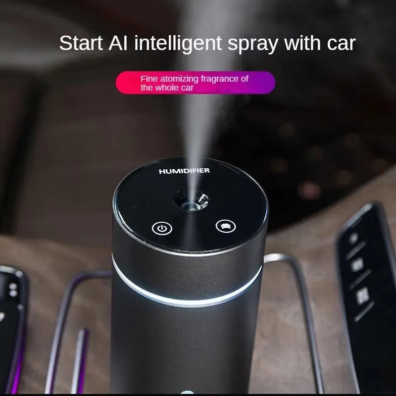Compact aluminium car air humidifier and essential oil diffuser with night light on wooden desk