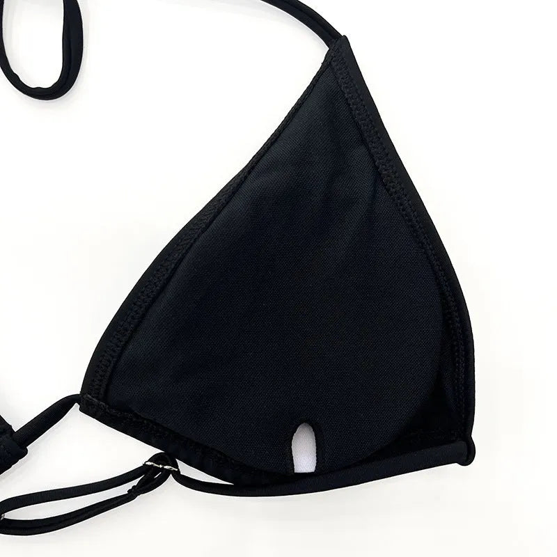 Black long sleeve mesh bikini swimsuit set for women, four pieces.