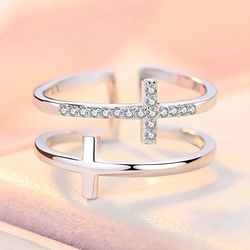 Adjustable double cross geometric copper ring with white gold finish and inlaid zircon gems.