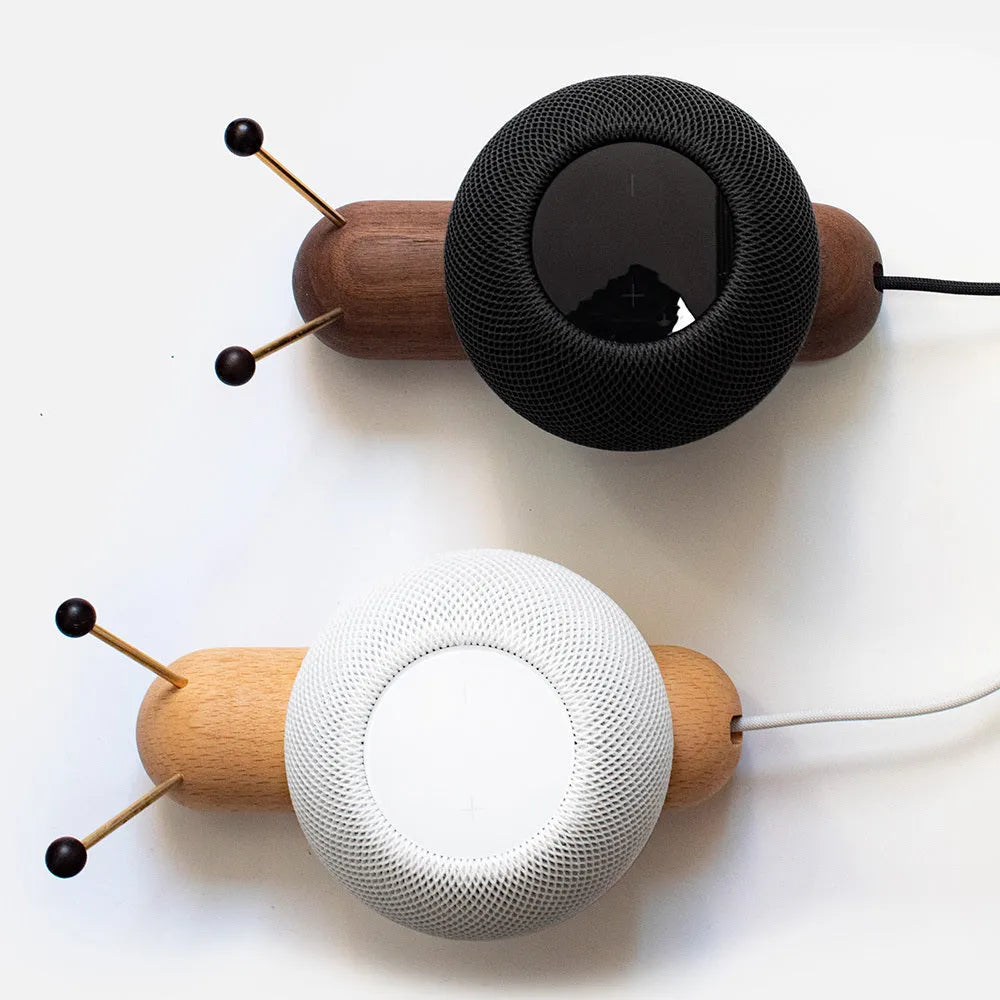 Khaki coloured non-slip desktop bracket for a smart Bluetooth speaker or HomePod.