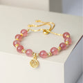 Women's Strawberry Quartz crystal bracelet with geometric design and Fu character, electroplated metallic finish