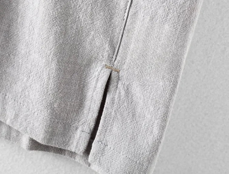 Men's loose fit cotton and linen casual shirt in a solid colour, shown in light grey.