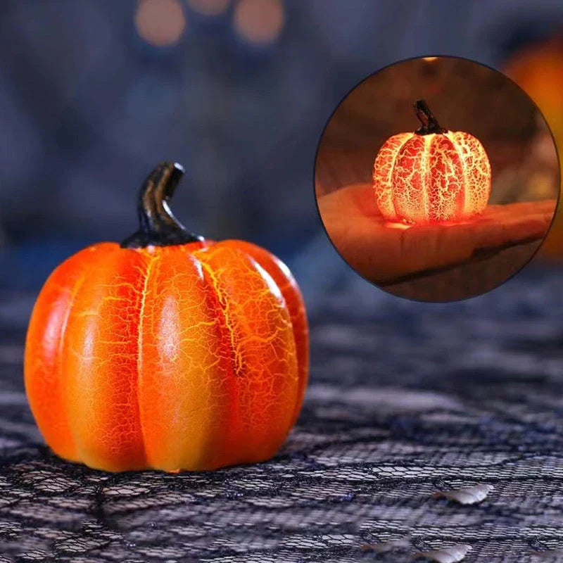 Enchanting resin pumpkin lanterns with realistic textures and LED candle illumination for Halloween decor and celebrations