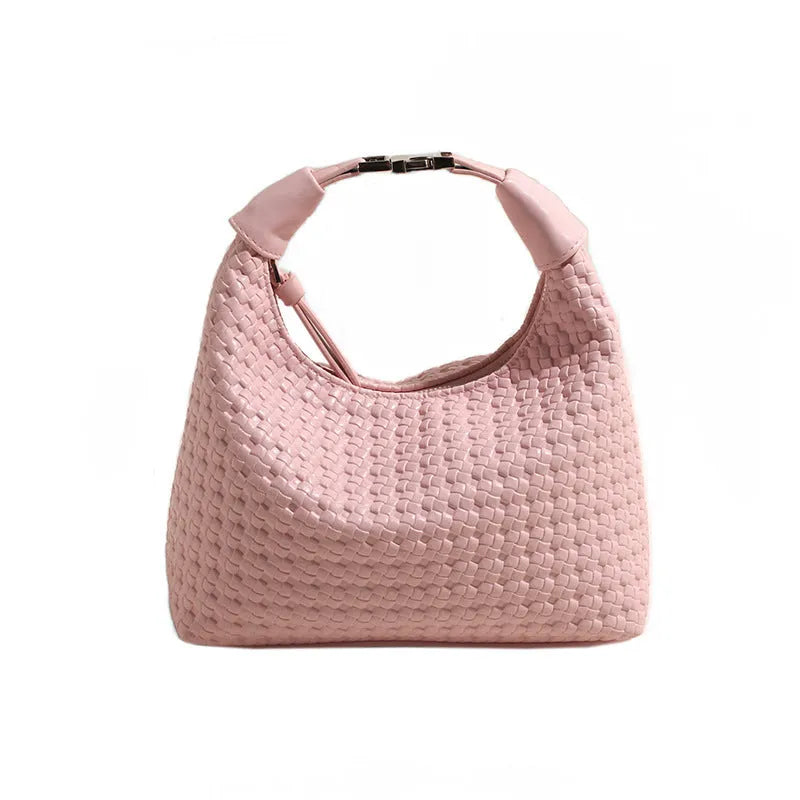 Soft PU leather messenger bag in bucket shape with internal document compartment, shown in a choice of colours.