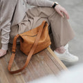 Genuine leather dumpling shoulder bag with wide strap in retro tan or retro black for women daily wear
