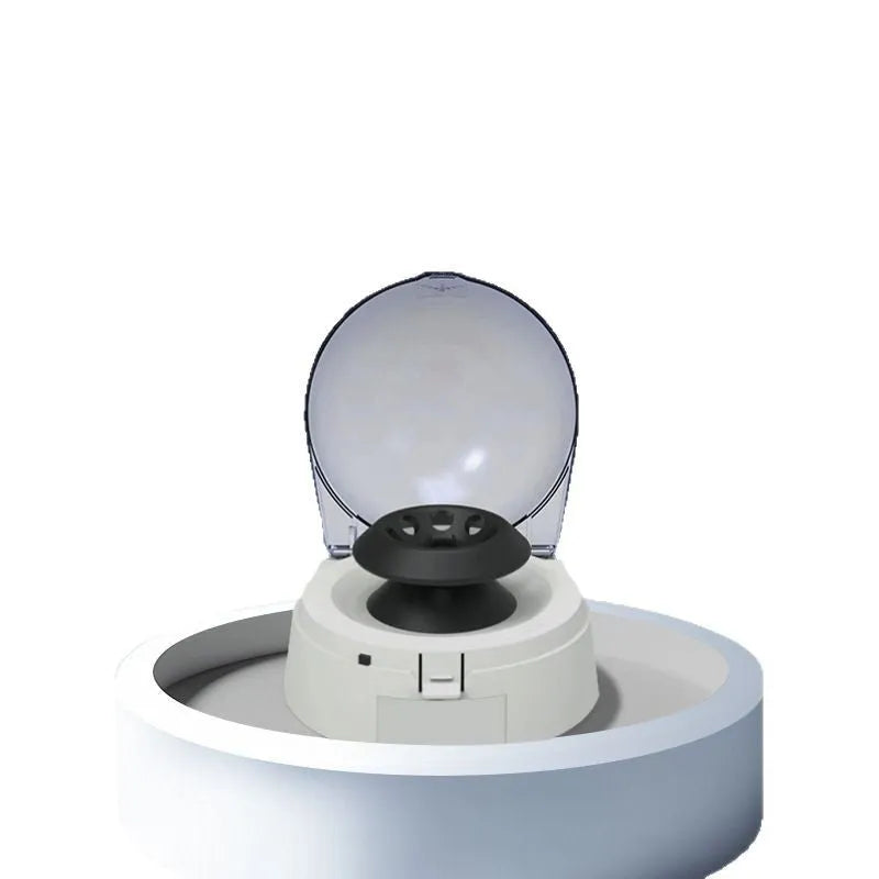 Compact mini laboratory centrifuge on a benchtop with dimensions 157mm by 170mm