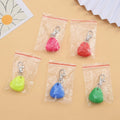 Silicone triangle light-up pendant pet ornament in red, pink, blue, green, or yellow colours.