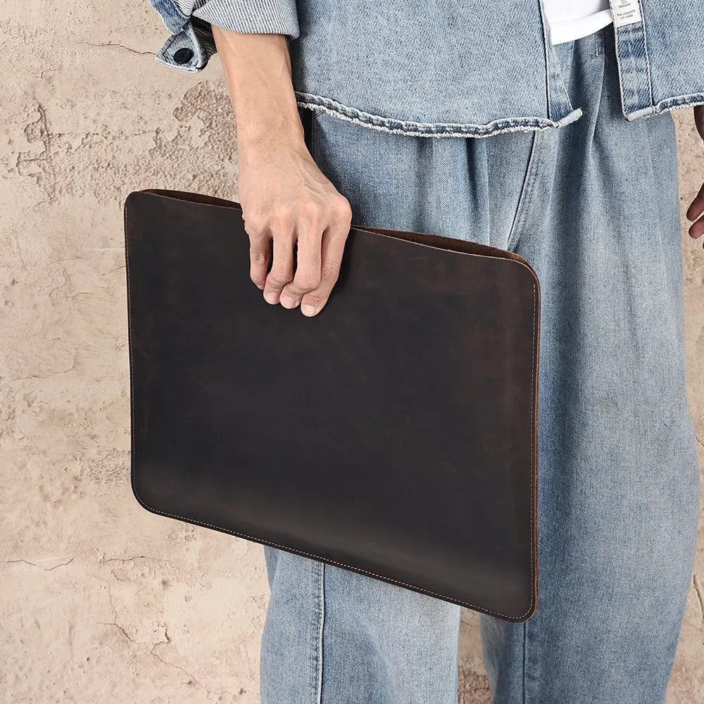 Brown genuine leather computer bag with horizontal laptop sleeve compartment