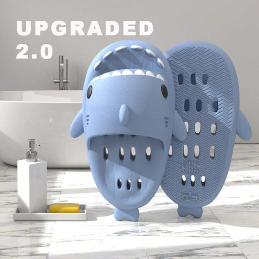 Shark-inspired shower slides with drain holes, featuring authentic shark design details and quick-drying EVA material