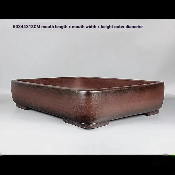 Handmade antique rectangular purple clay flower pot showing its dimensions and natural finish.