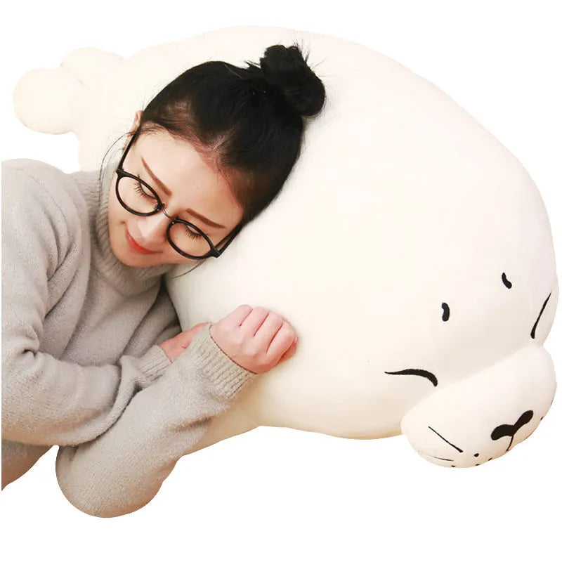 White sea lion plush toy with short plush fabric and PP cotton filling on display