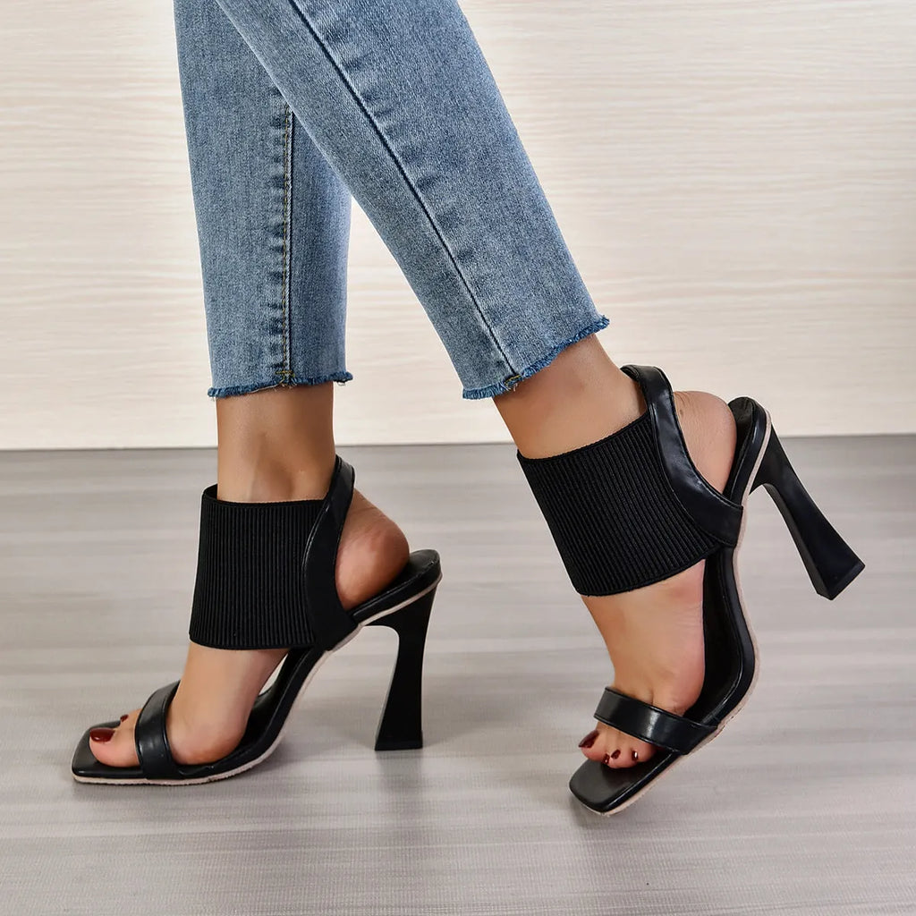 Women's high heel sandals with elastic strap in black, milky white and brown colours