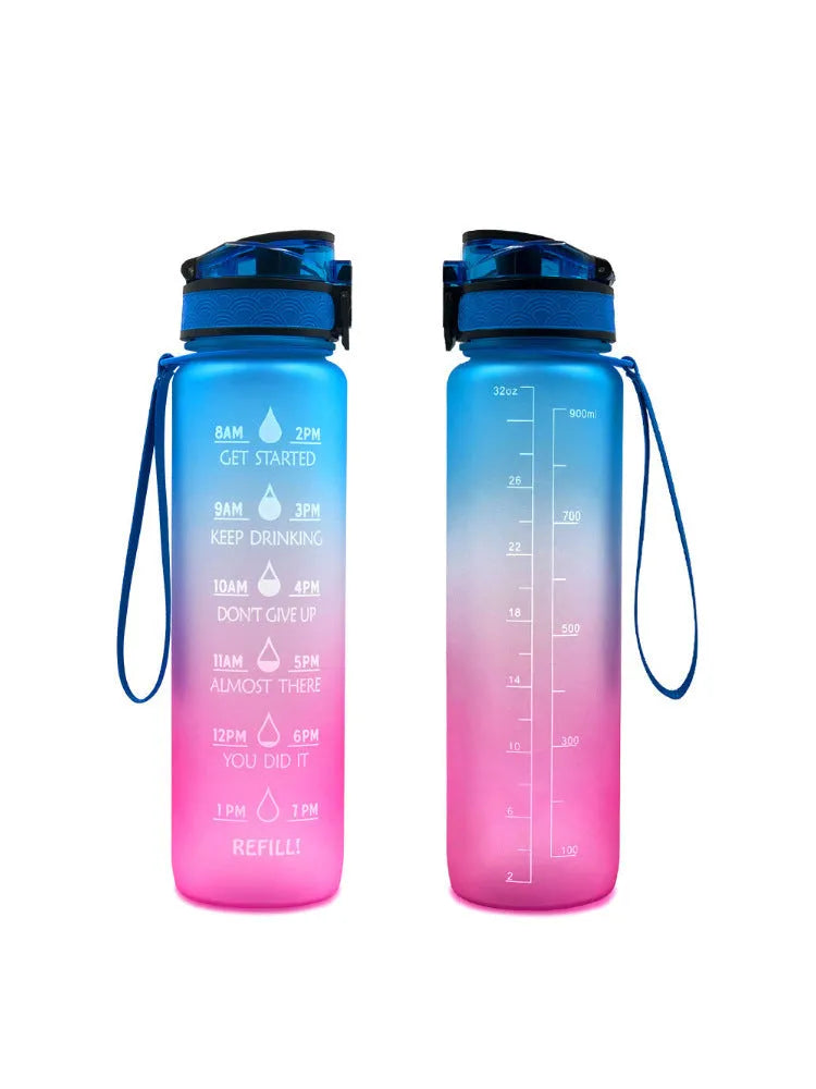 Clear transparent 1000ml sports water bottle with blue lid and removable fruit infuser inside.