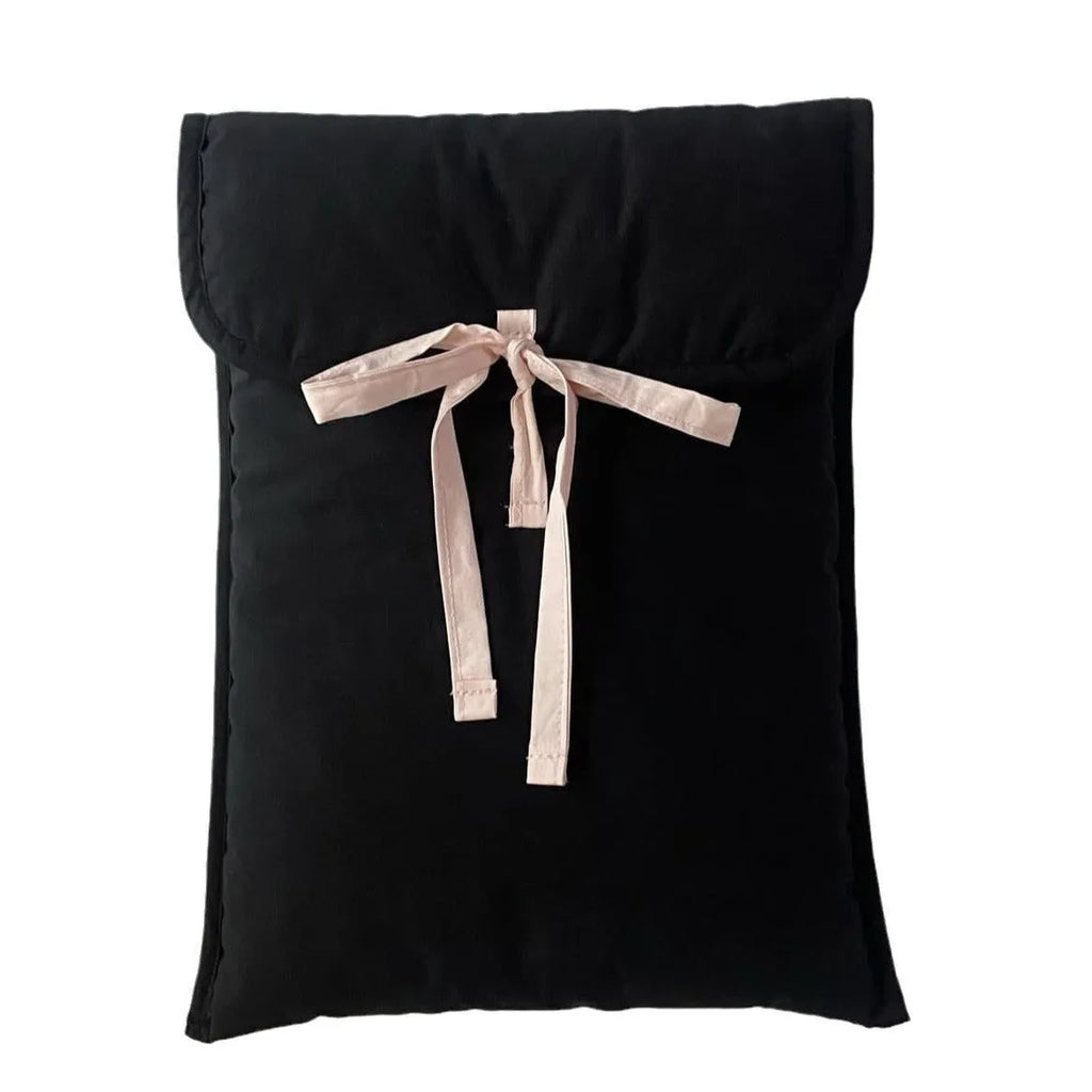 Women's black quilted laptop bag with ballet bow and striped pattern design