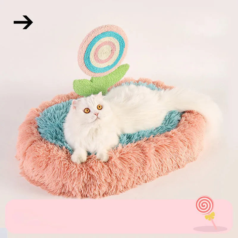Pink elliptical plush cat bed with removable cover for small to medium cats