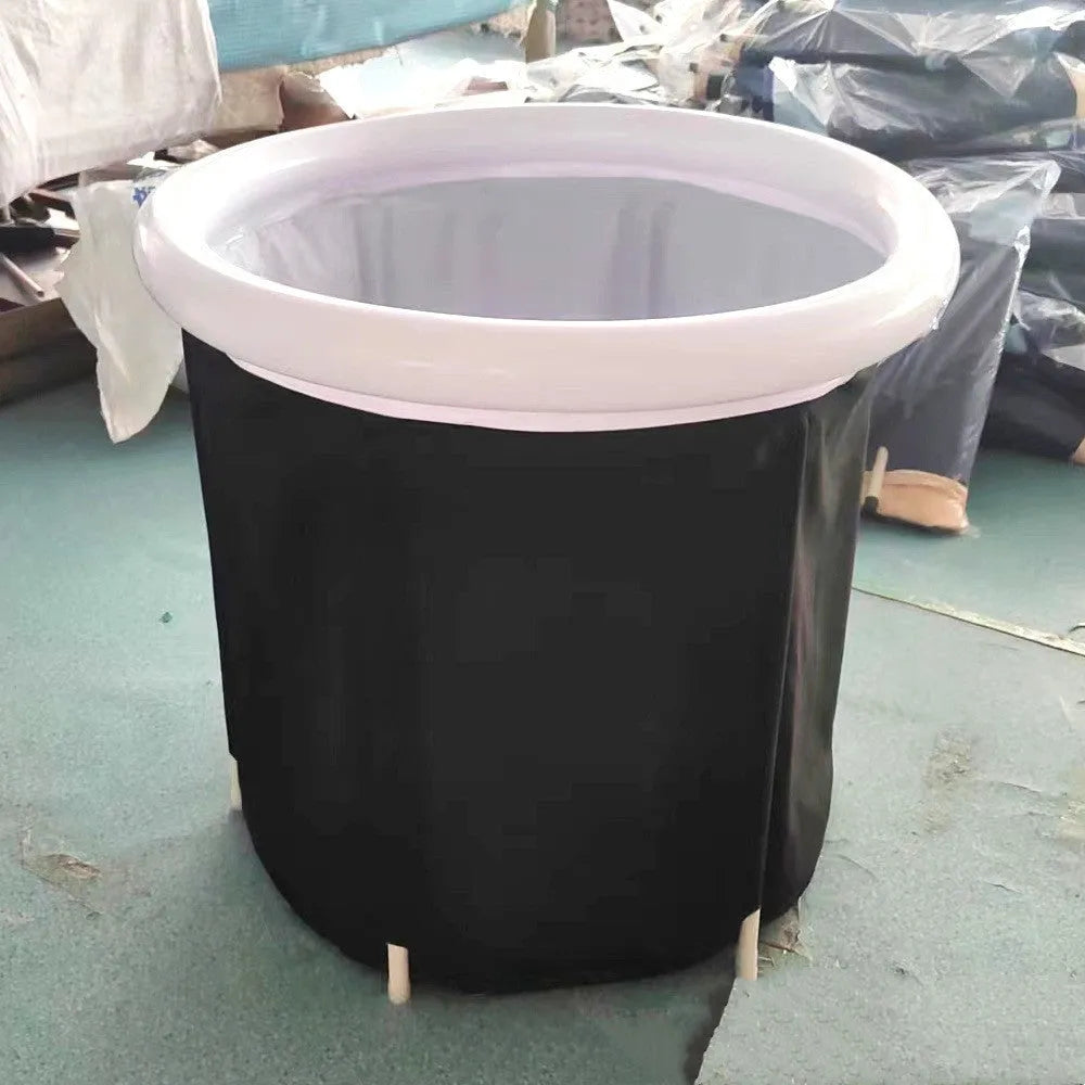Black portable inflatable ice bath tub measuring 70x80cm with weather lid and drainage components