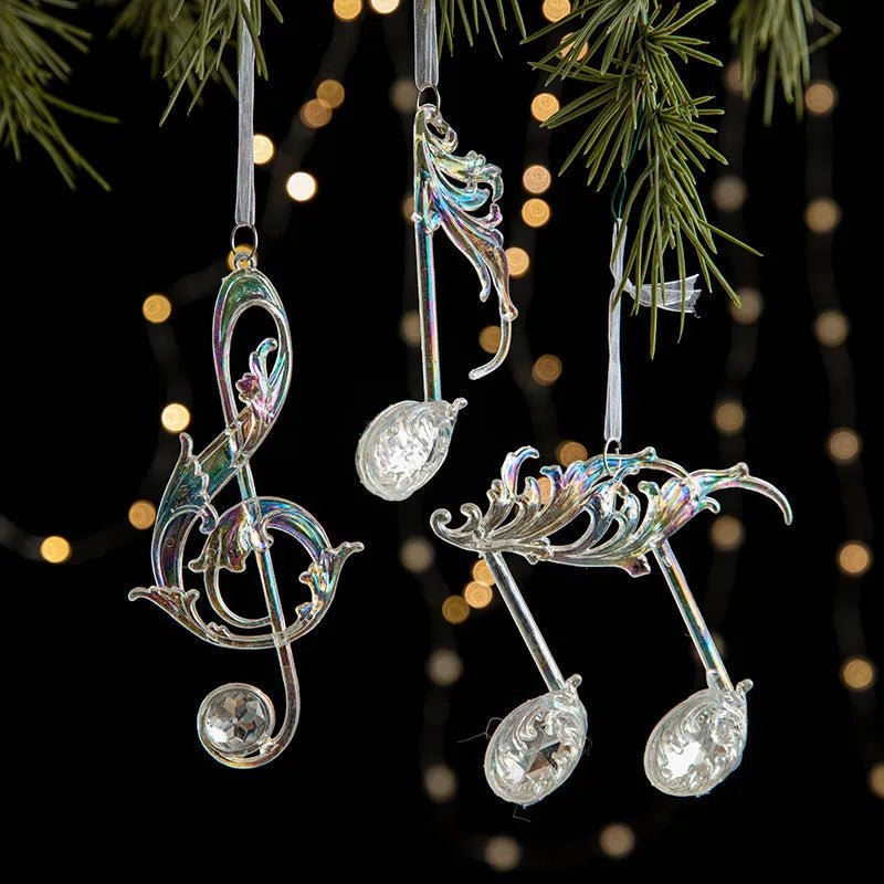 Colourful transparent acrylic Christmas hanging decorations in assorted festive shapes for tree and window displays