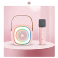 Wireless karaoke microphone with LED lights held next to its separate Bluetooth audio unit