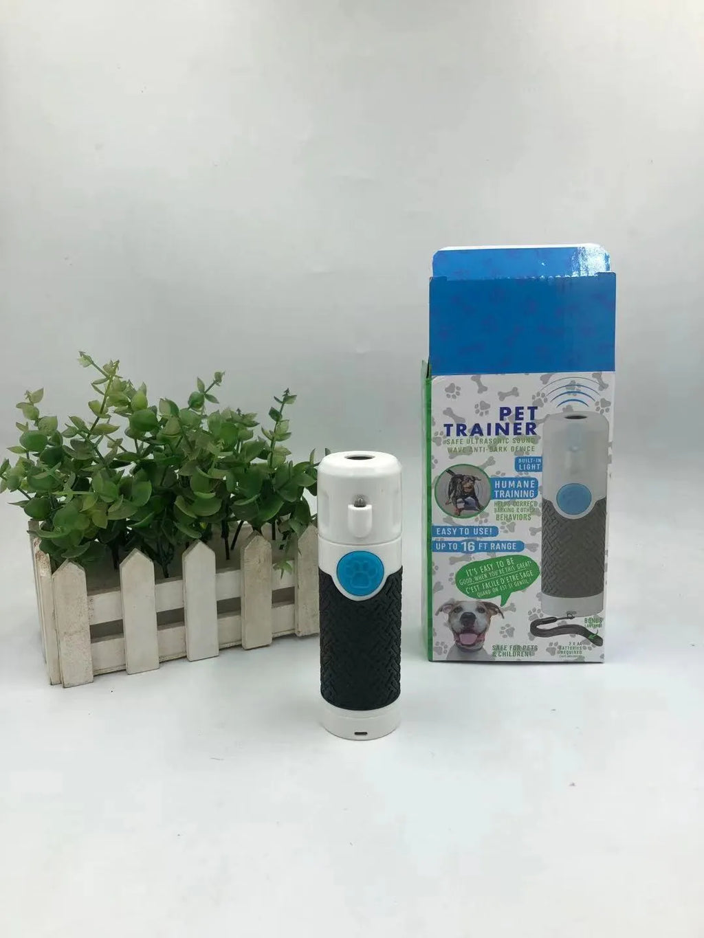 White ABS plastic ultrasonic dog trainer handheld device for barking correction