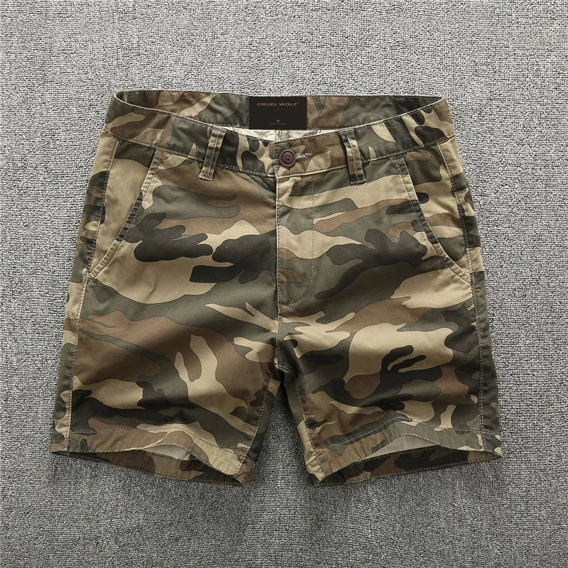 Cotton workwear shorts in camouflage pattern with zip fly and mid-waist fit