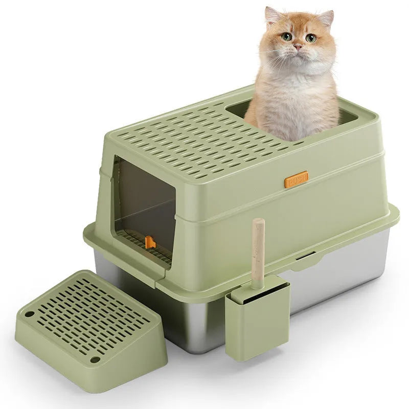 Grey fully enclosed hooded cat litter box with a foot pedal next to the front entrance door.