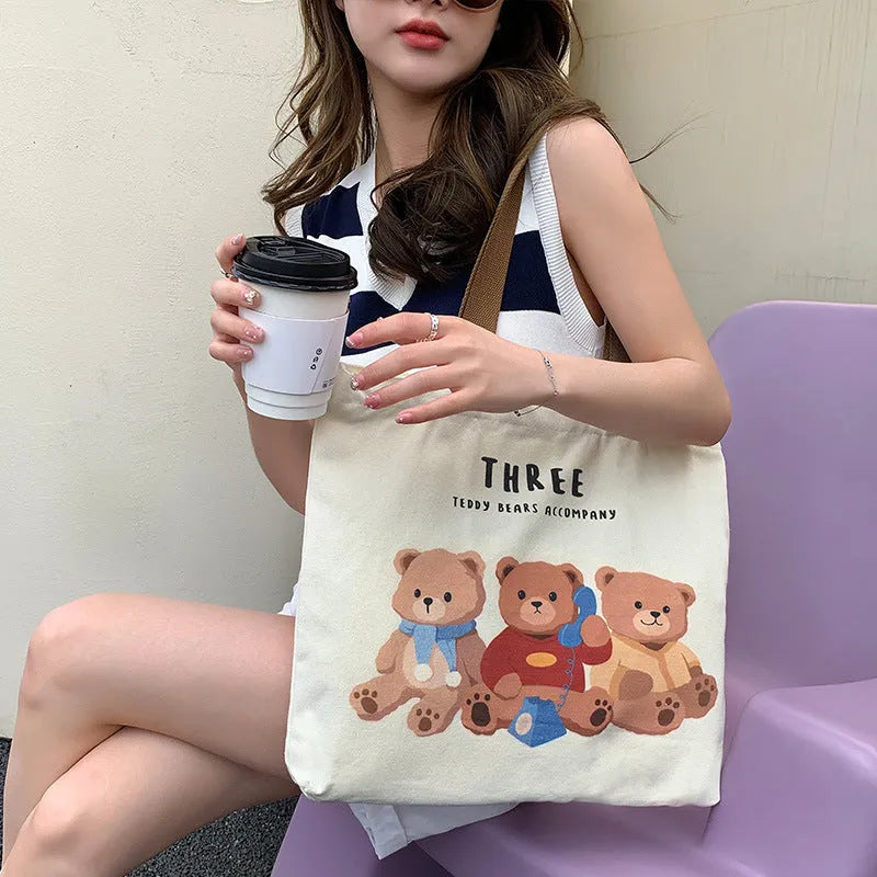 Cute bear printed canvas shoulder bag in beige and black colourways for women and students