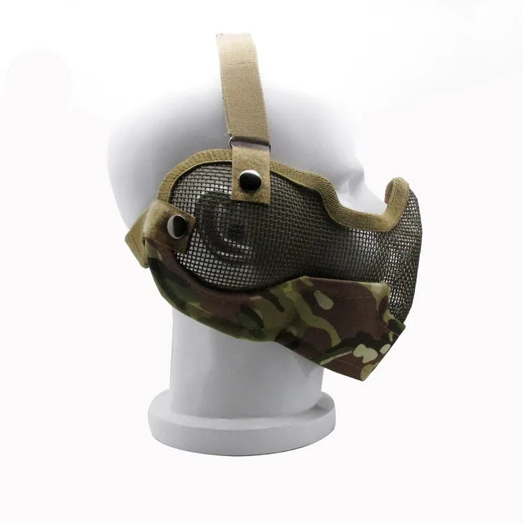 Carbon steel protective face mask in tactical camouflage pattern with head-mounted design for outdoor field defence