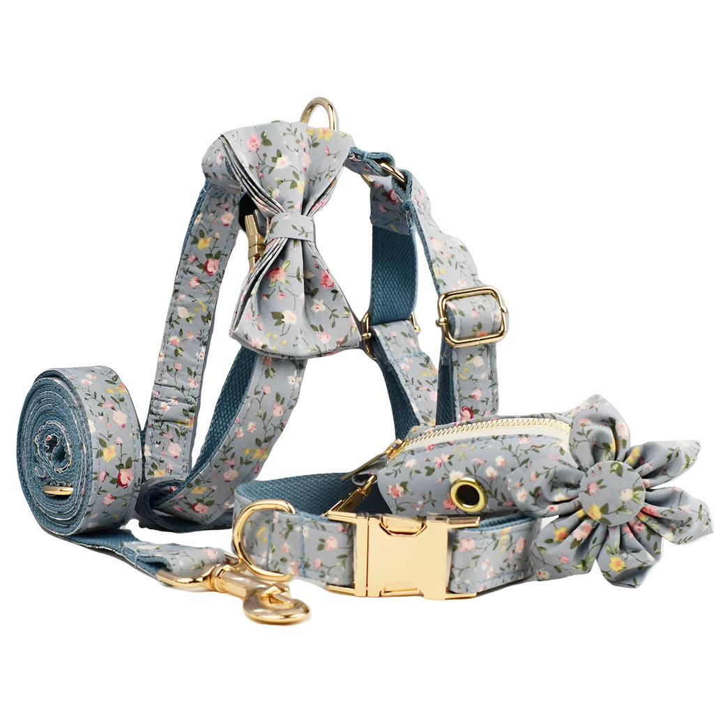 Blue floral polyester cotton dog collar set with matching leash, bow, vest and waste bag holder accessories