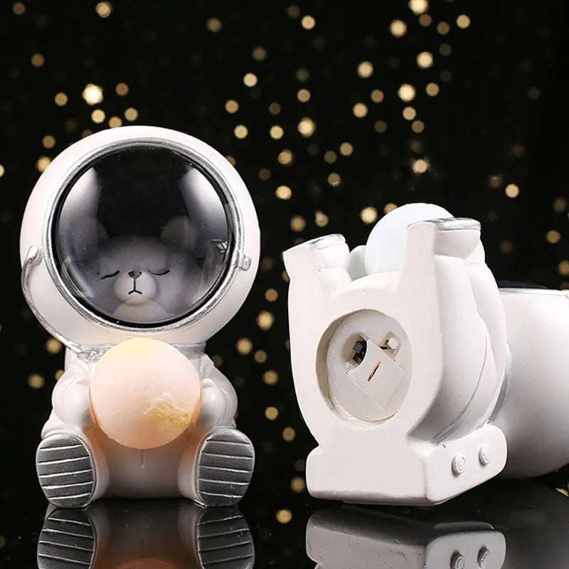 Animal-themed resin night light projecting starry sky lighting effect on surface
