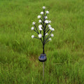 Outdoor solar LED garden ground lamp in flower shape with PVC shell and IP65 protection