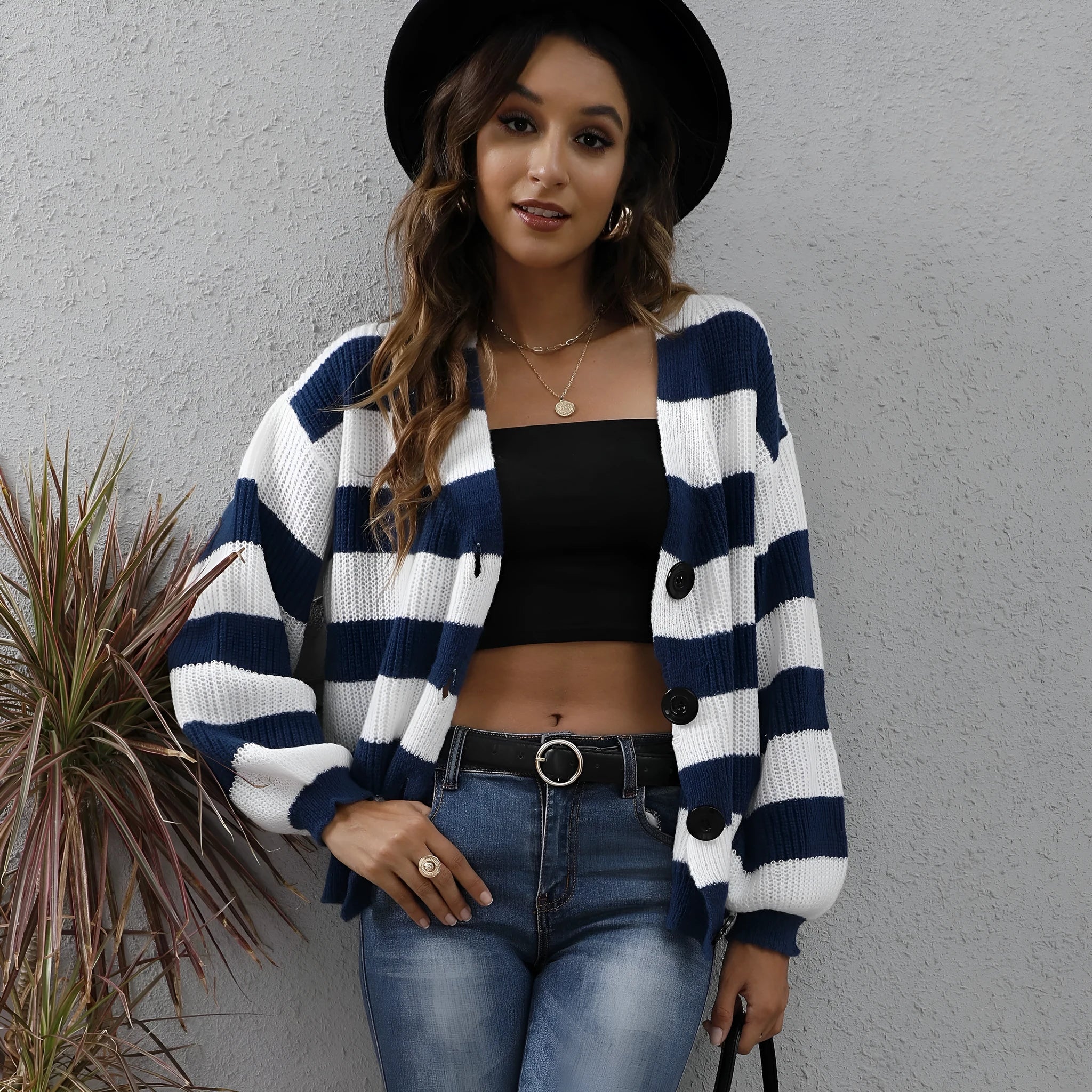 Women's striped button-front cardigan in deer plush fabric available in four colours.