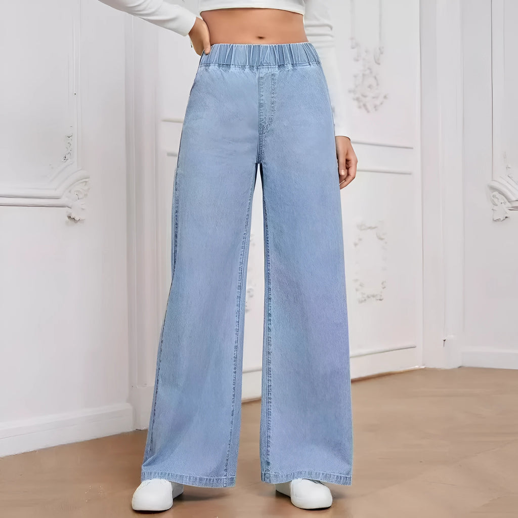 Light blue washed wide-leg plus size straight jeans with mid waist zip fly