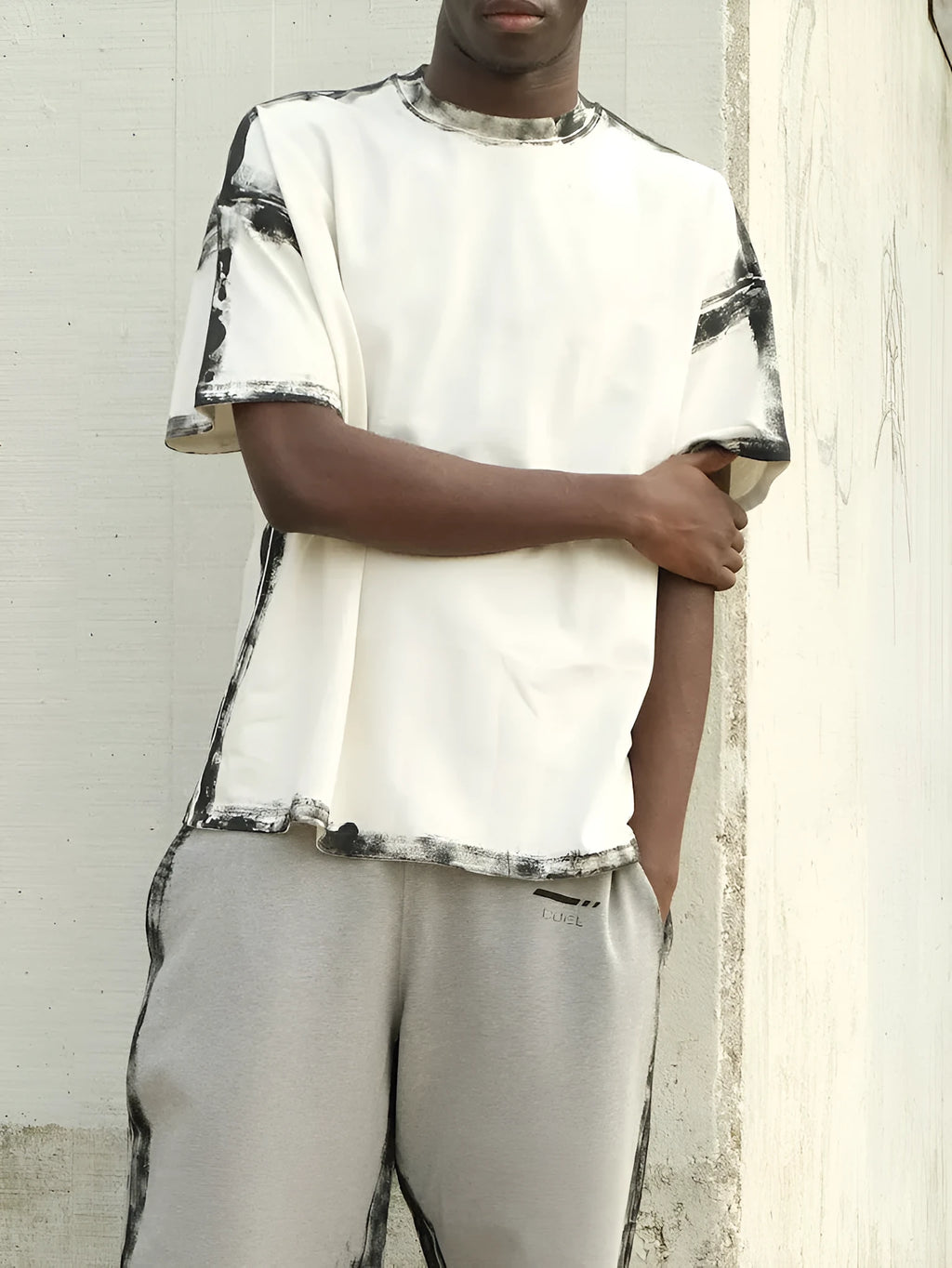 White casual short sleeve top with draped design and printed details