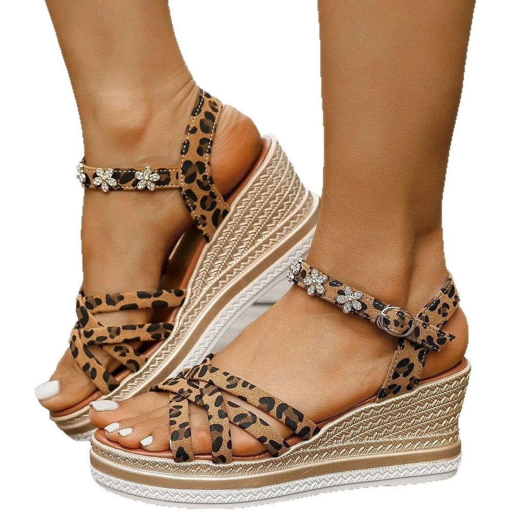Light brown suede women's platform sandals with a buckle ankle strap.