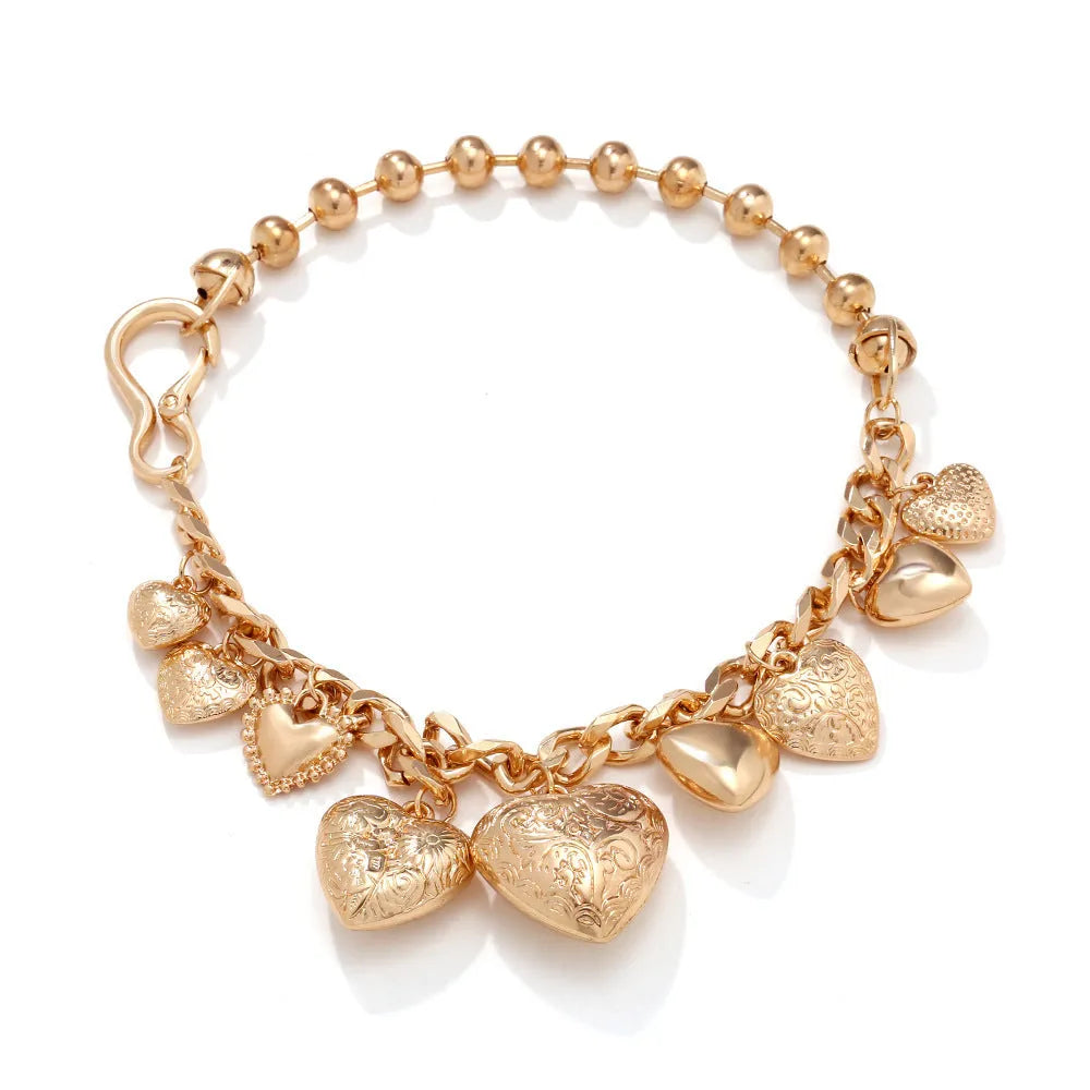 Carved heart pendant necklace in alloy metal with adjustable chain length between 41cm and 50cm