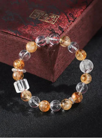 Handmade women's bracelet featuring freshwater pearls combined with citrine crystals