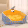 Triangular pet sleeping nest with removable cushion in green, purple and yellow colour options